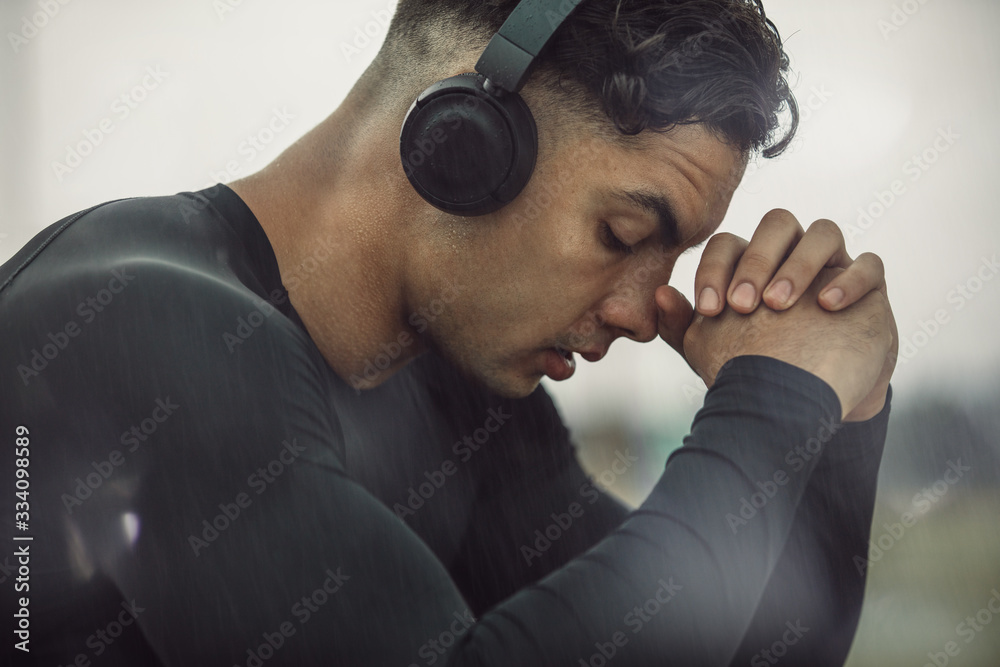 Man feeling tired after intense workout