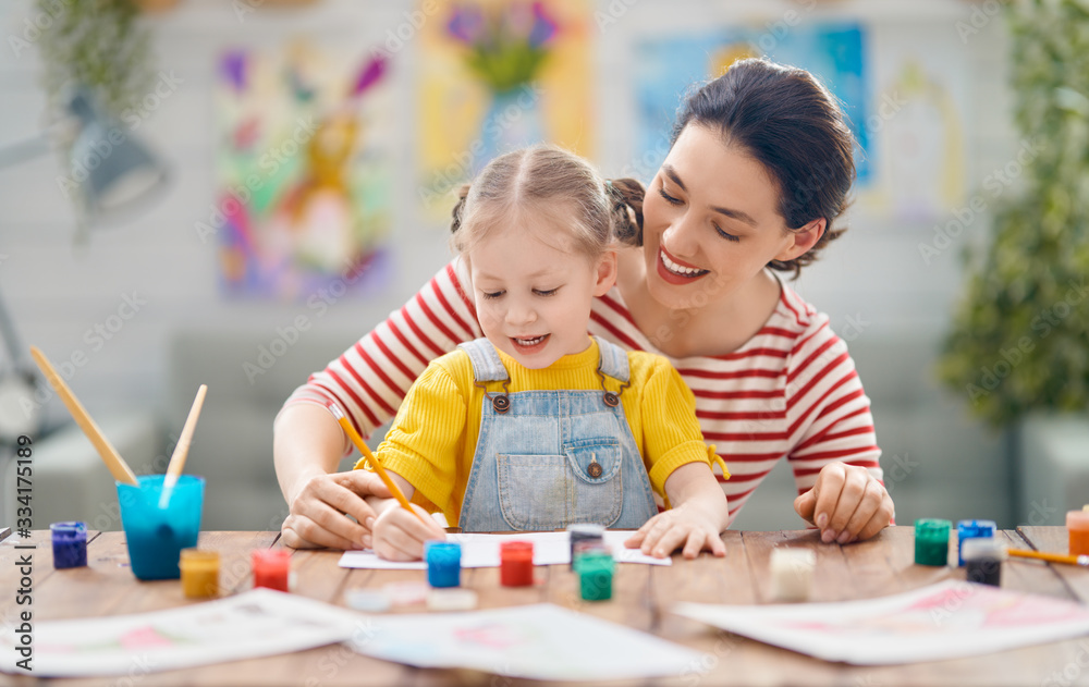 Happy family painting together.