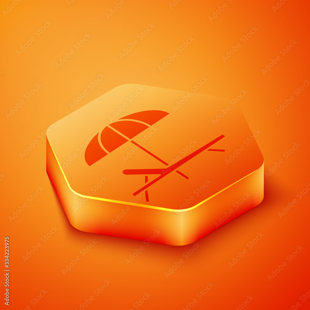 Isometric Sunbed icon isolated on orange background. Beach umbrella and Sun lounger. Orange hexagon 