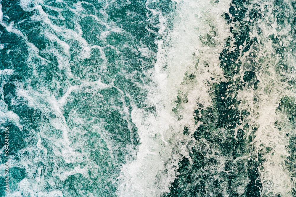 Seething atlantic sea water with foam, jet, stream Cape Cod