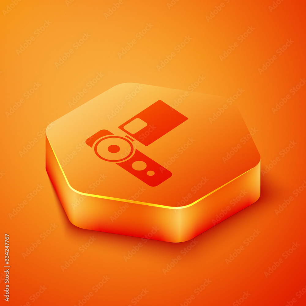 Isometric Cinema camera icon isolated on orange background. Video camera. Movie sign. Film projector