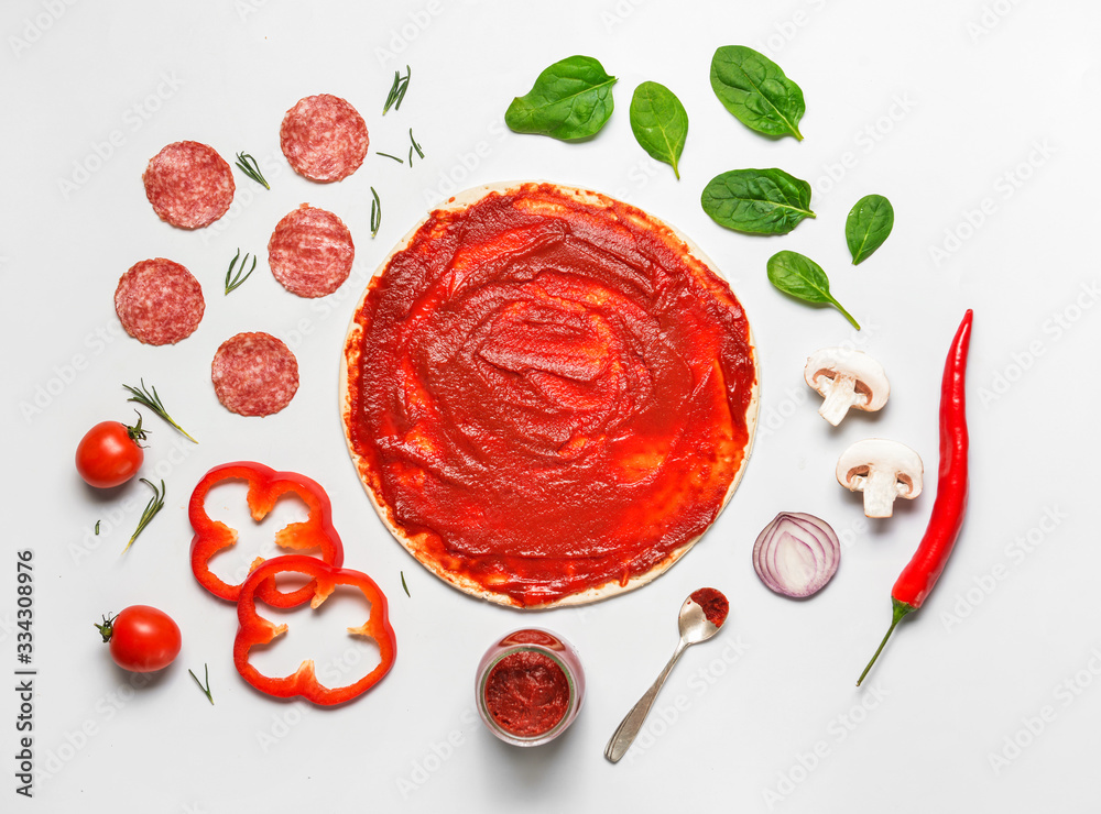 Ingredients for tasty pizza on white background