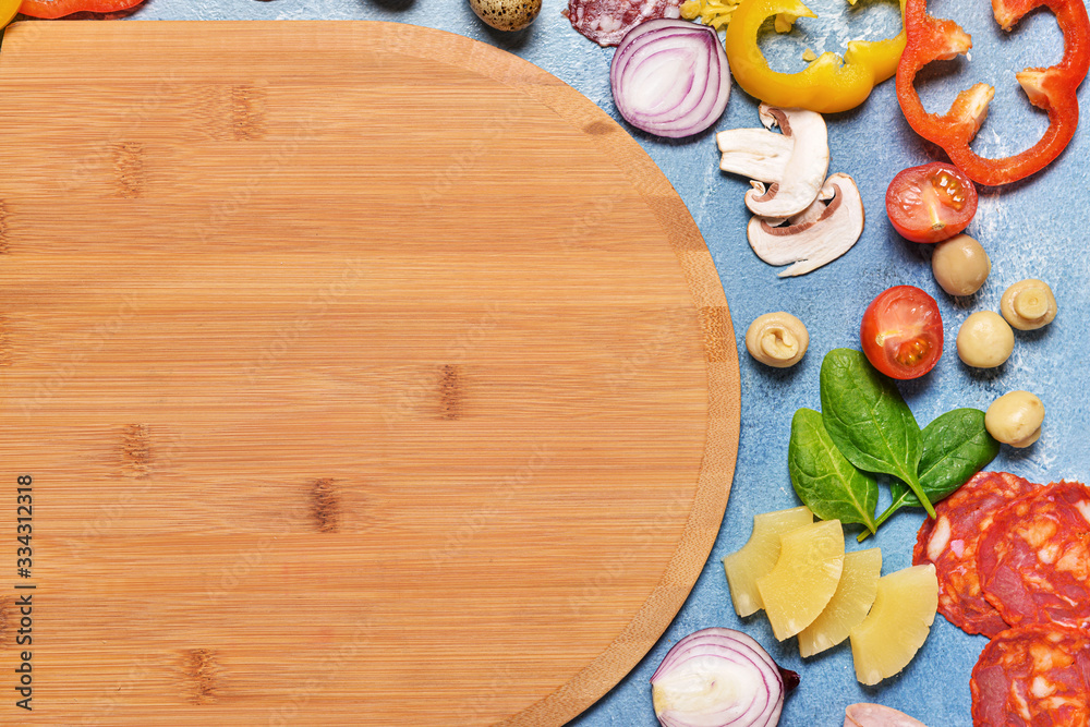 Ingredients for tasty pizza with board on color background