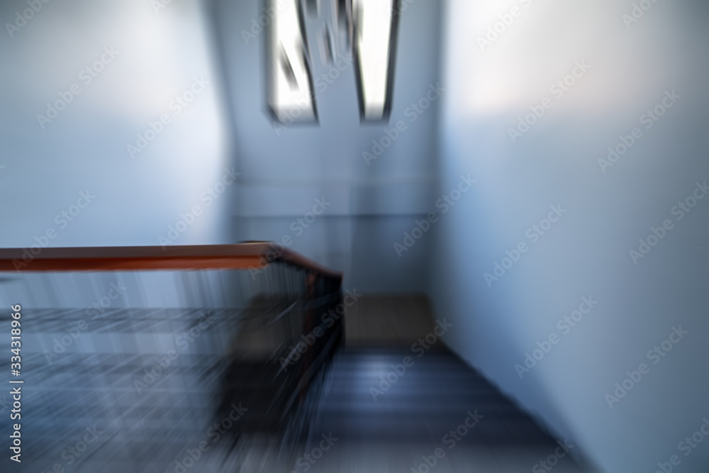 Zoom motion blurred effect abstract background of Staircase luxury home in modern villa.