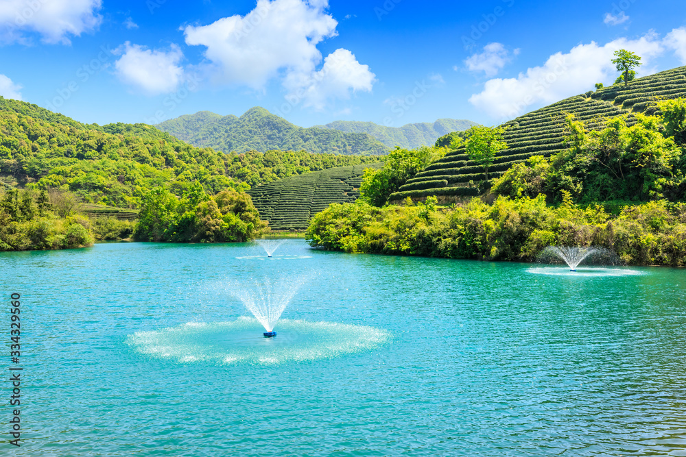 Clean water and green mountain nature landscape.