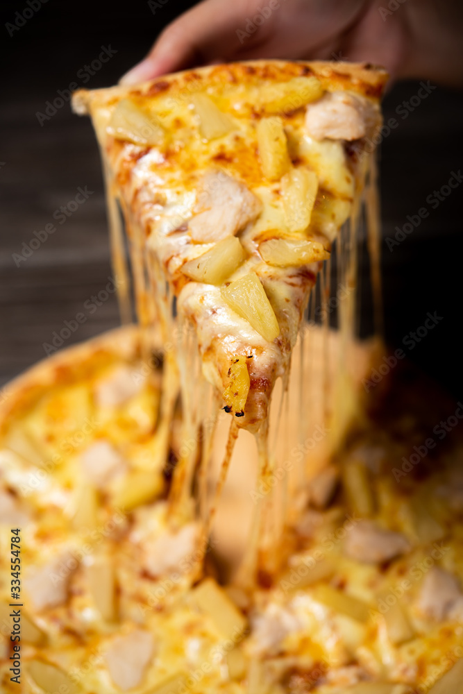 Stretched cheese pizza 