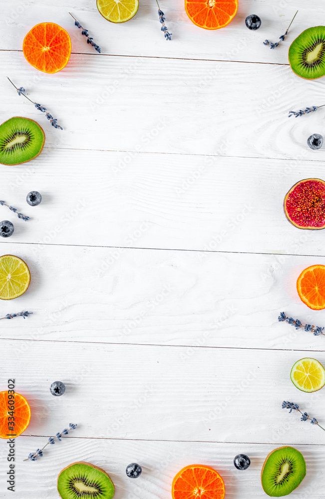 cut fruit frame design with lavender on white background top view mockup