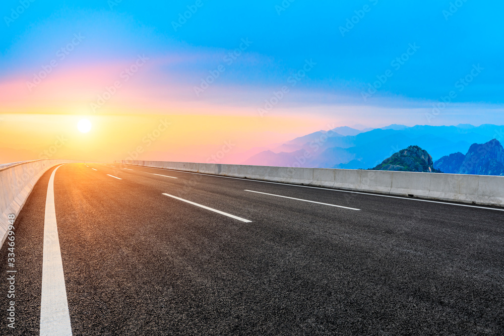 Empty road and mountain with sky sunset clouds landscape.