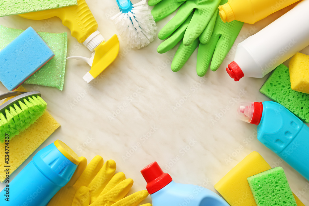 Set of cleaning supplies on light background