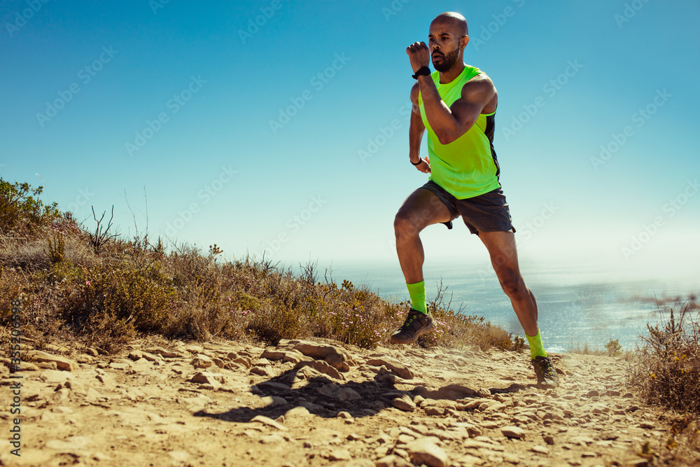 Sportsman running in the mountains