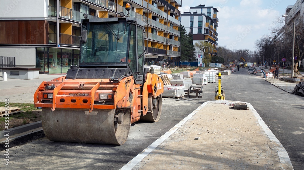 Laying a new asphalt on the road. Construction of the road.