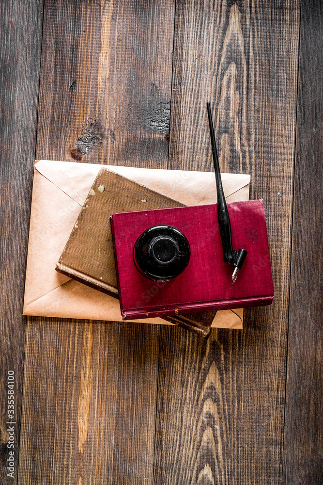 Writer workplace with tools on wooden background top view mock up