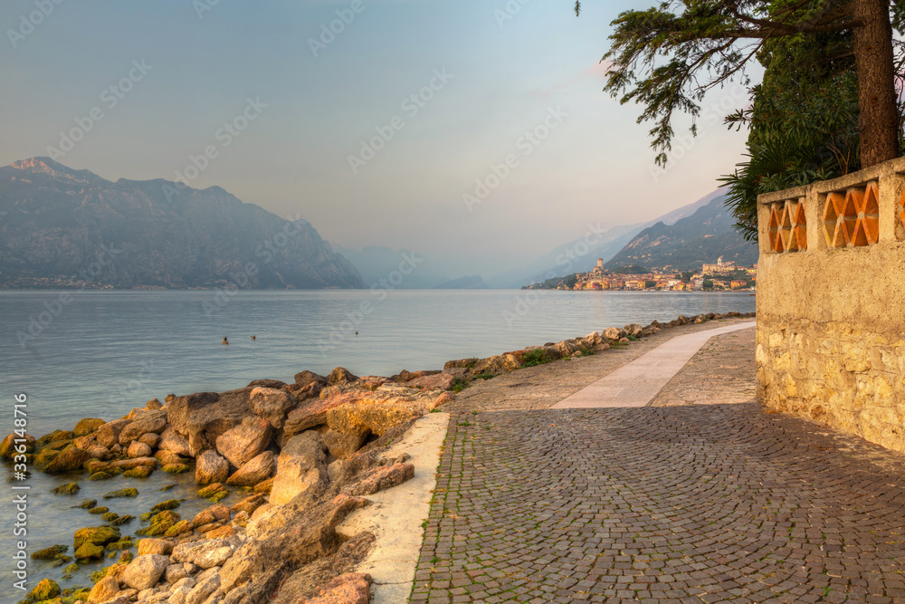 Beautful coastline of Garda lake at sunset, northern Italy