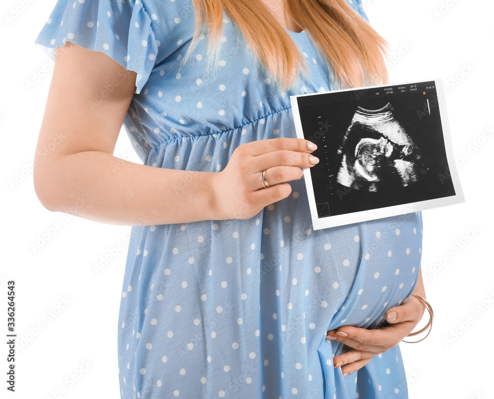 Beautiful pregnant woman with sonogram image on white background