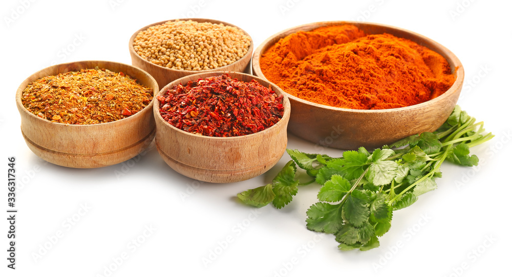 Different spices on white background