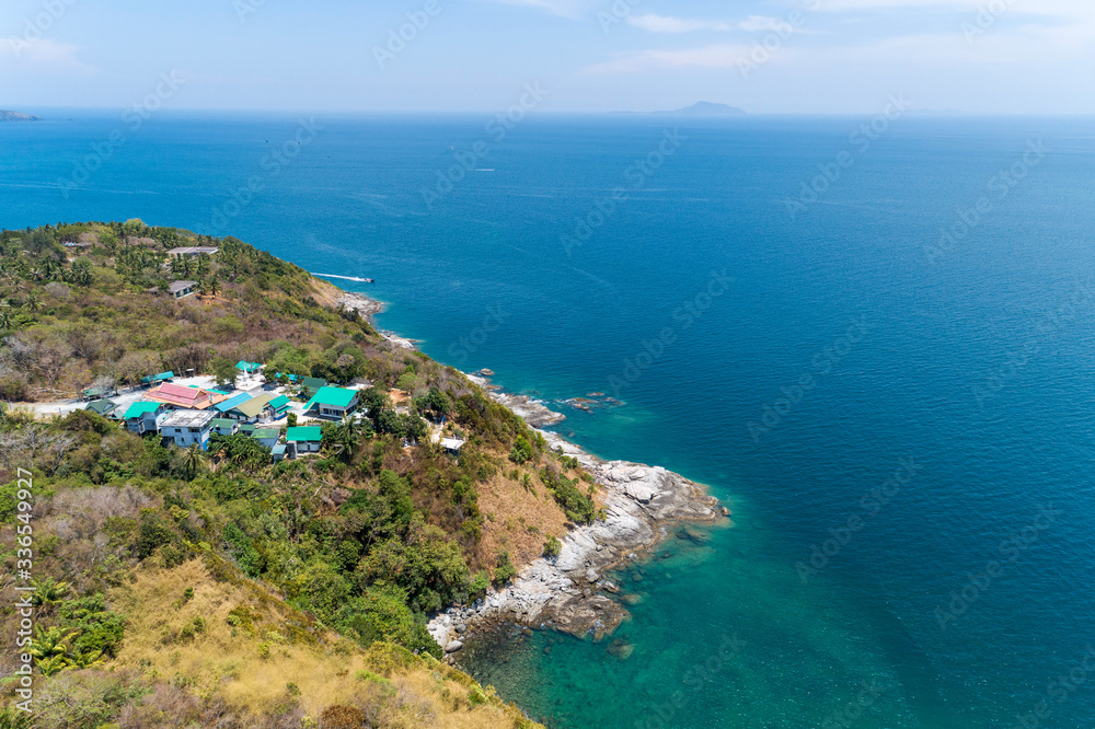 Aerial view drone shot of seashore beautiful scenery andaman sea in summer season,phuket thailand.