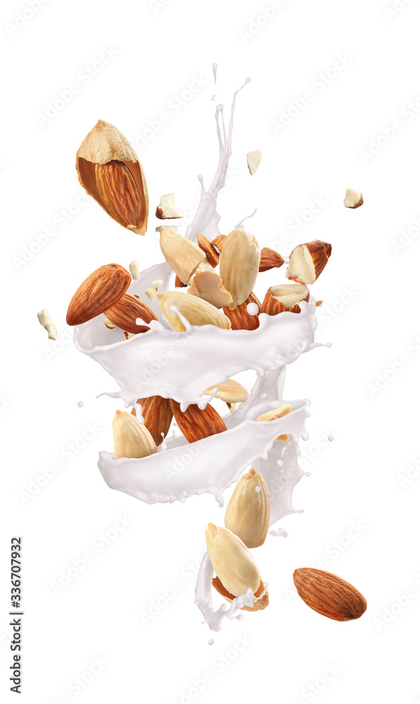 Whirlwind of milk with almonds on a white background