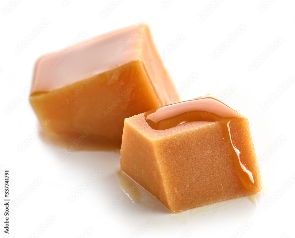 caramel pieces on white background