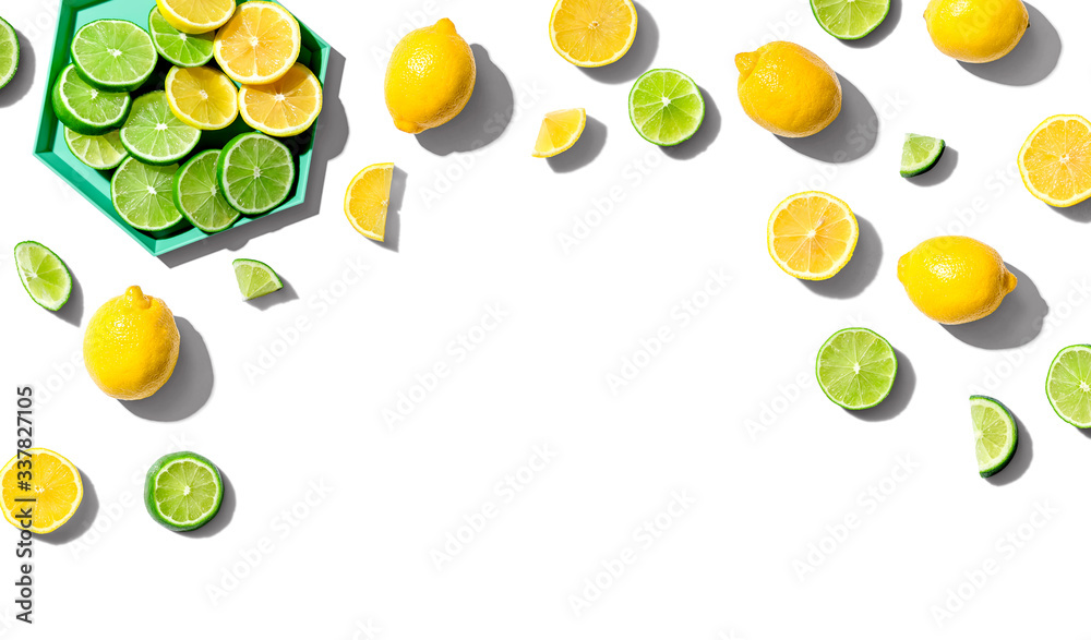 Fresh lemons and limes overhead view - flat lay