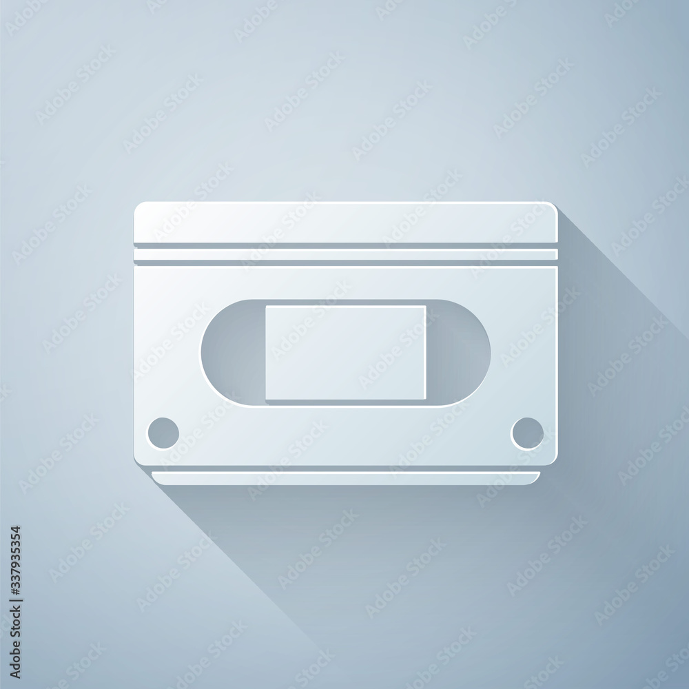 Paper cut VHS video cassette tape icon isolated on grey background. Paper art style. Vector Illustra