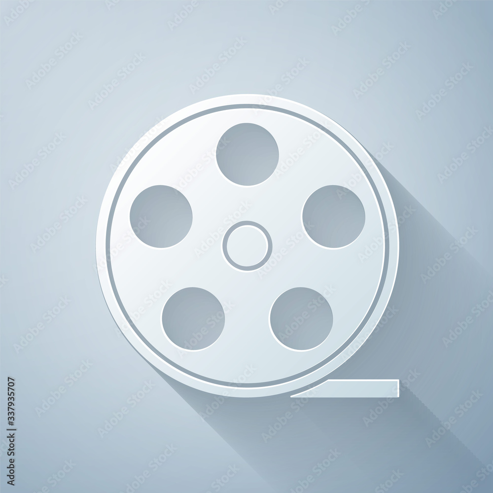 Paper cut Film reel icon isolated on grey background. Paper art style. Vector Illustration