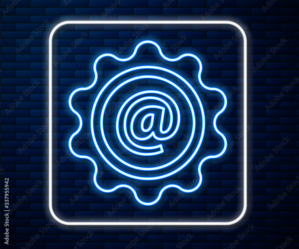 Glowing neon line Mail and e-mail icon isolated on brick wall background. Envelope symbol e-mail. Em