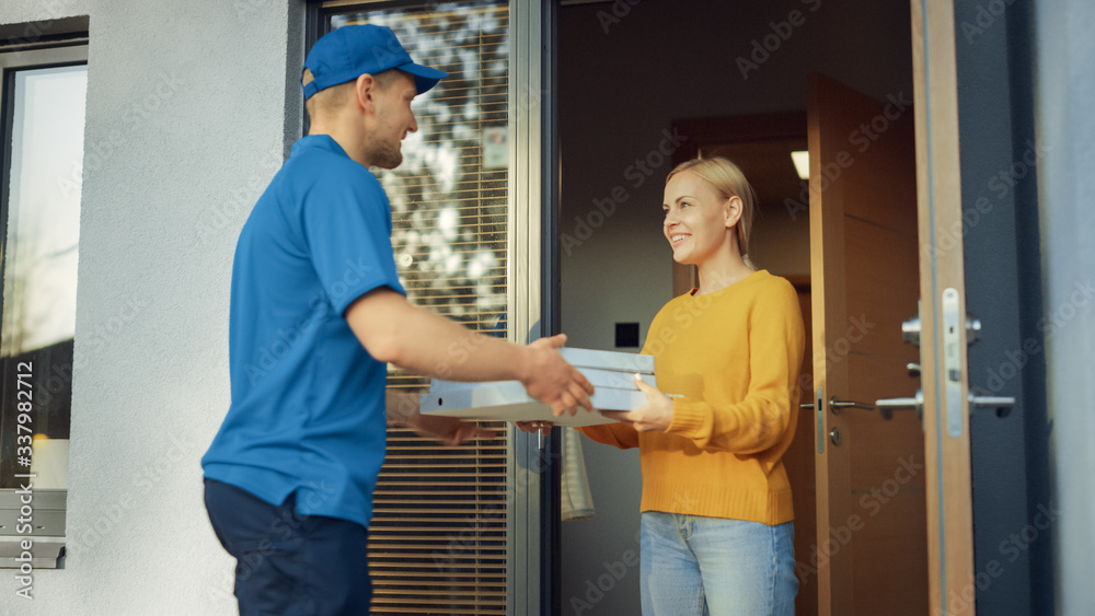 Beautiful Young Smiling Woman Opens Doors of Her House and Meets Pizza Delivery Man who Gives Her Ca