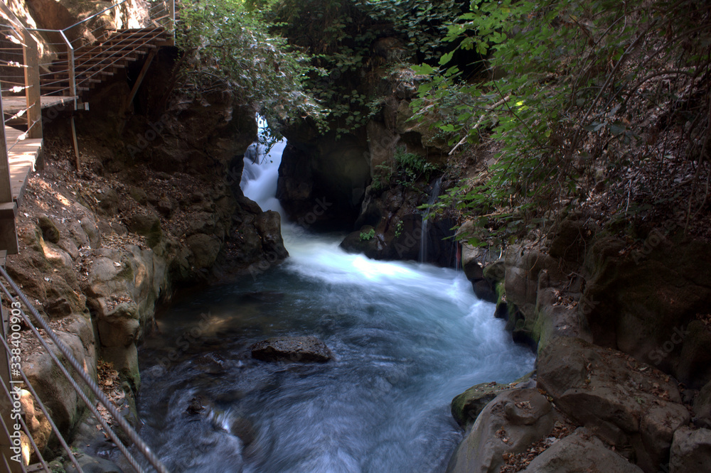 waterfall in the mountains in the nature