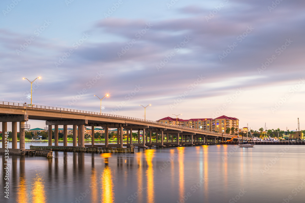 Bradenton, Florida, USA downtown on the Manatee River at dusk.