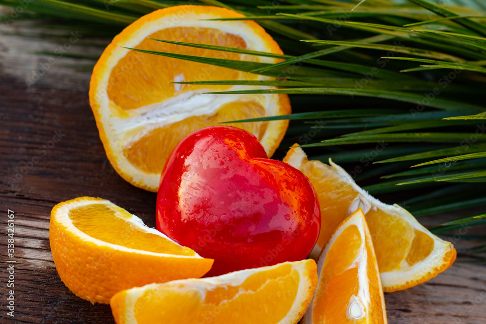 Fresh organic oranges on a wooden table