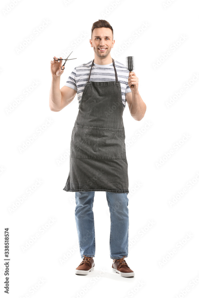 Portrait of male hairdresser on white background