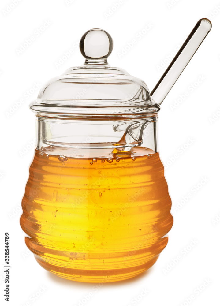 Jar of sweet honey on white background