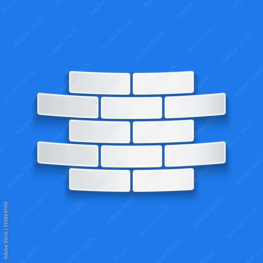 Paper cut Bricks icon isolated on blue background. Paper art style. Vector Illustration