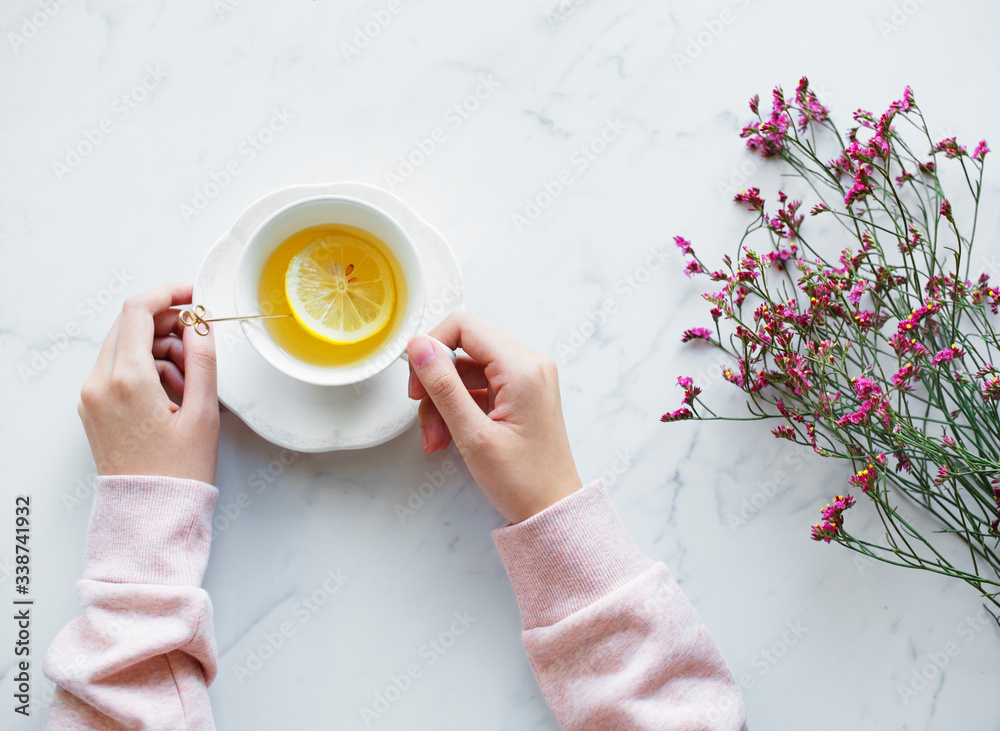 Aerial view of woman with a hot cup of tea