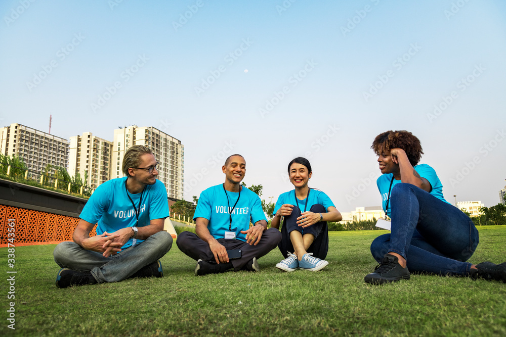 Group of happy and diverse volunteers