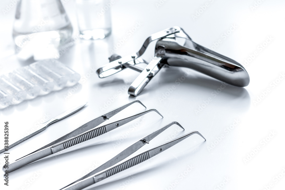 instruments of gynecologist on white background