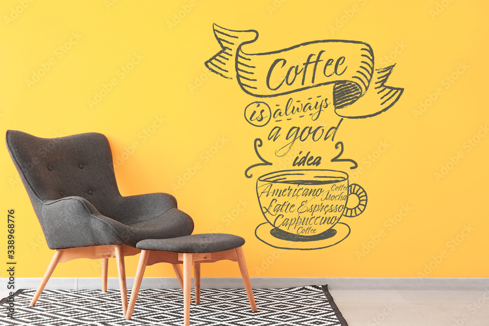 Stylish armchair near color wall with drawn cup of coffee