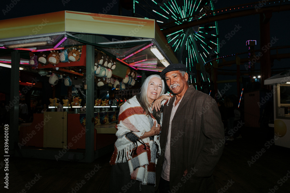 Senior couple enjoying a theme park visit