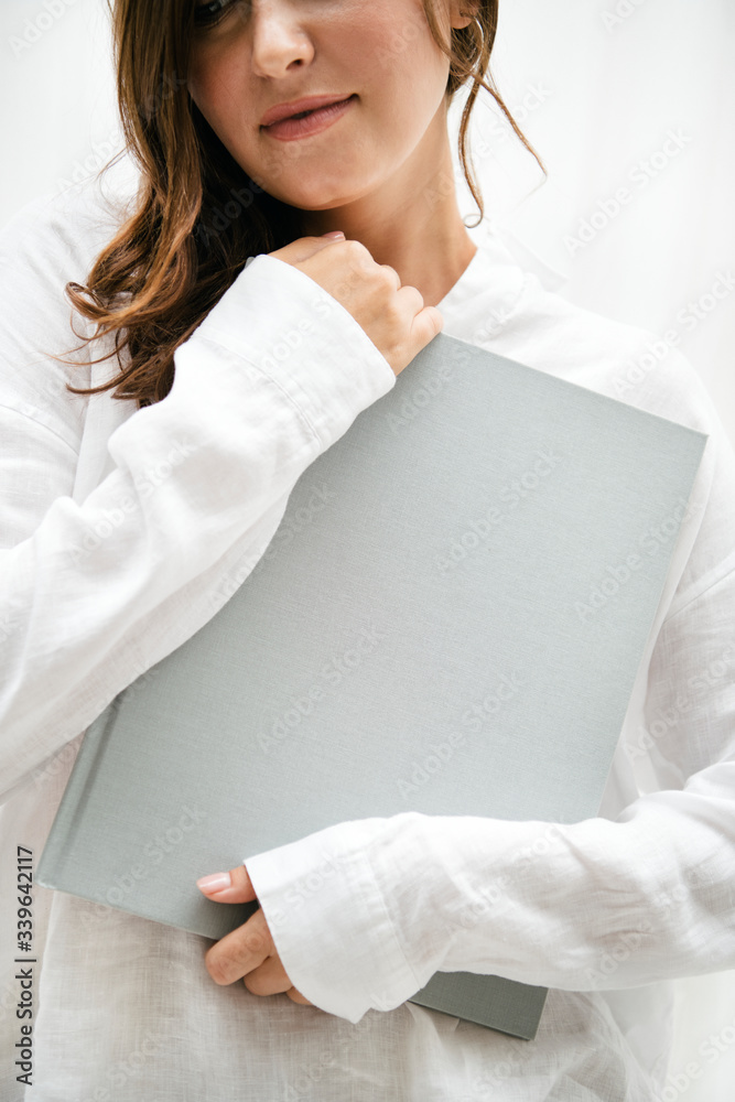 Woman holding a book