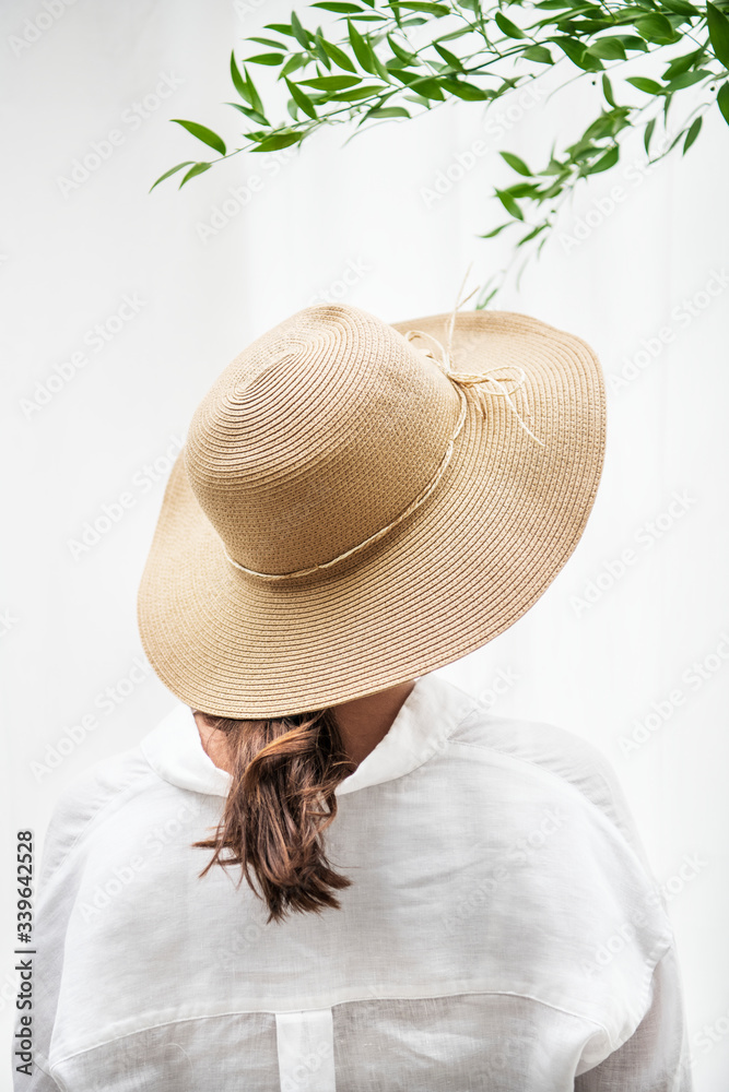 Portrait of a woman with leaves