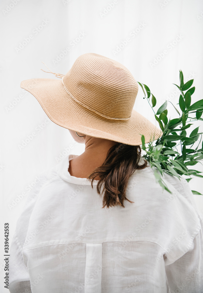 Portrait of a woman with leaves