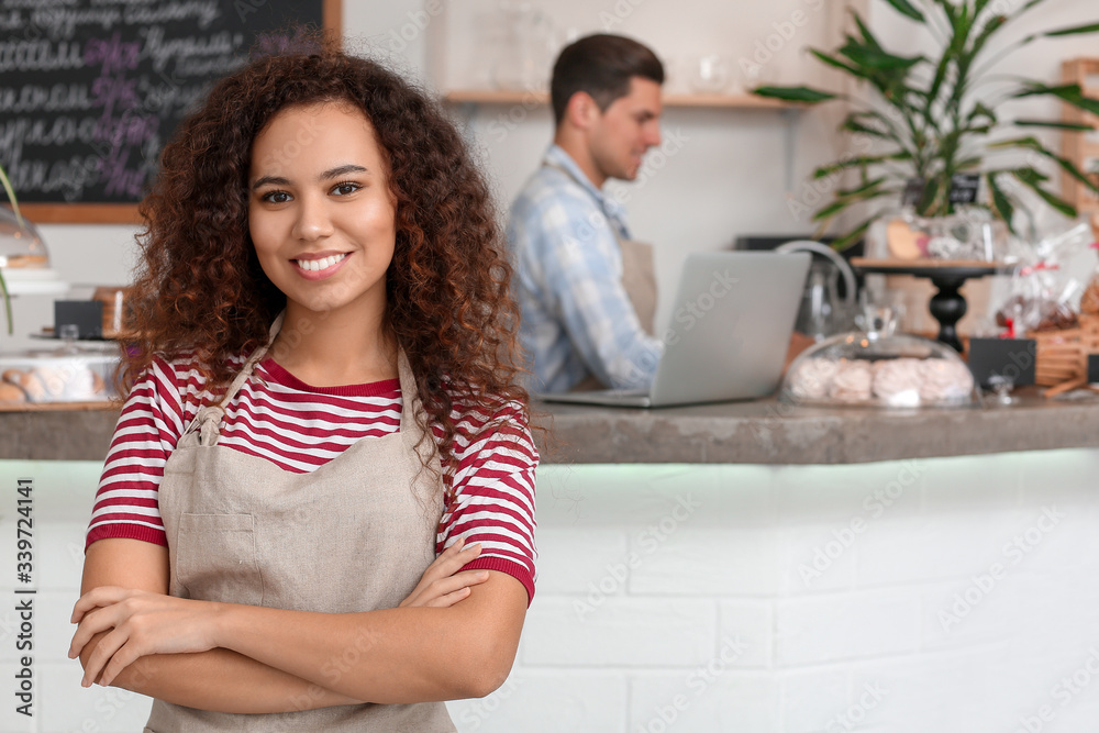 Portrait of business owner in her cafe