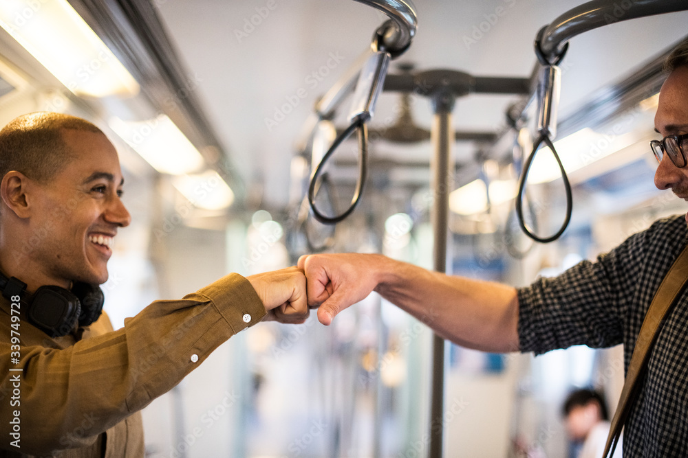 Friends giving a fist bump