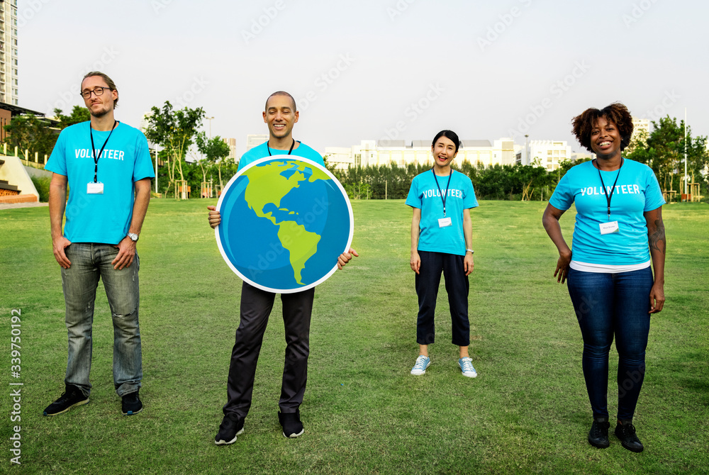 Group of happy and diverse volunteers