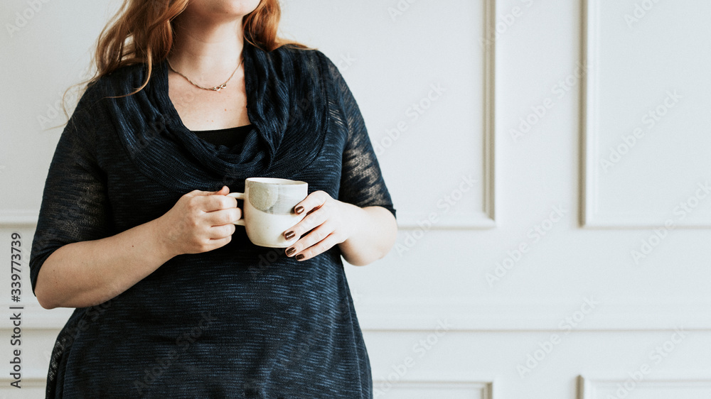 Woman having a hot drink