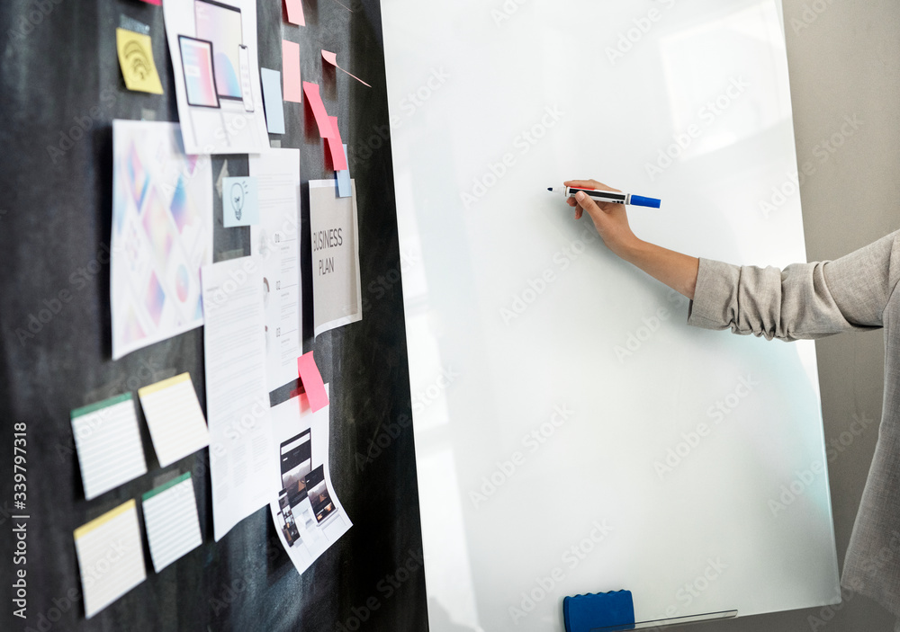 Man writing on a whiteboard