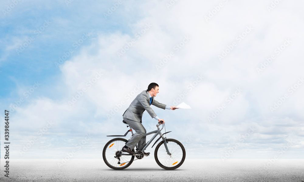 Businessman with paper documents in hand