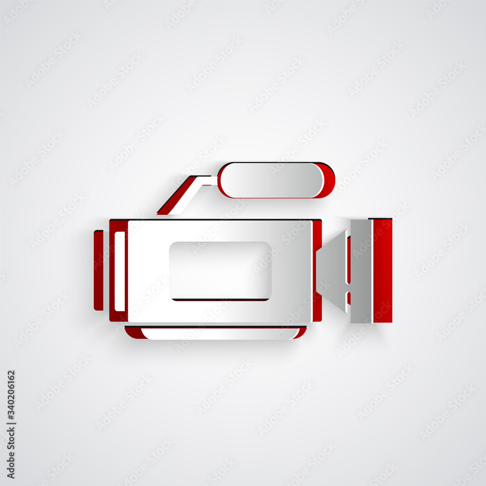 Paper cut Cinema camera icon isolated on grey background. Video camera. Movie sign. Film projector. 