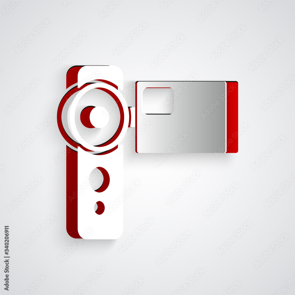 Paper cut Cinema camera icon isolated on grey background. Video camera. Movie sign. Film projector. 