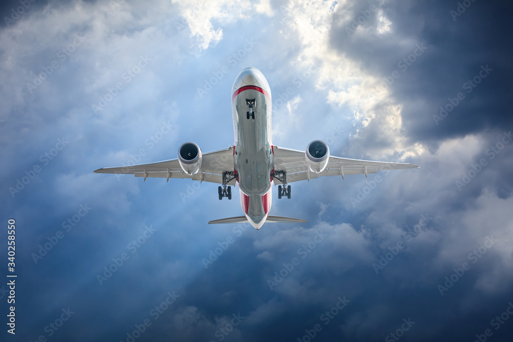 Commercial airplane flying in the sky,travel concept.